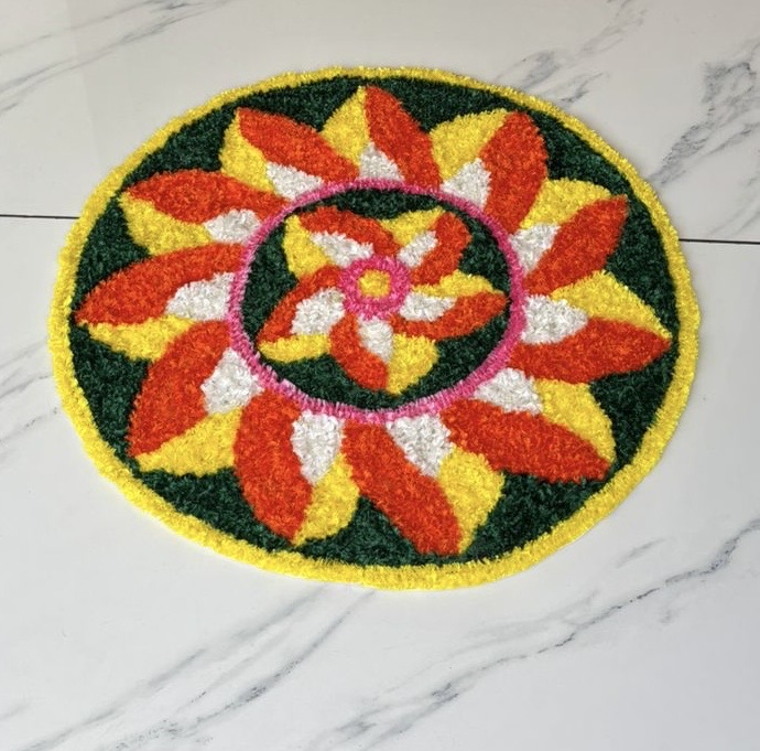 Lotus Inspired Yellow and Red Pookalam for Onam Décor